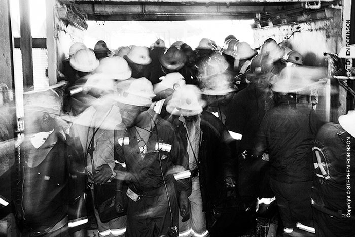 013_Pg27-KMK.6350BW-Coming up - underground miners at end of shift