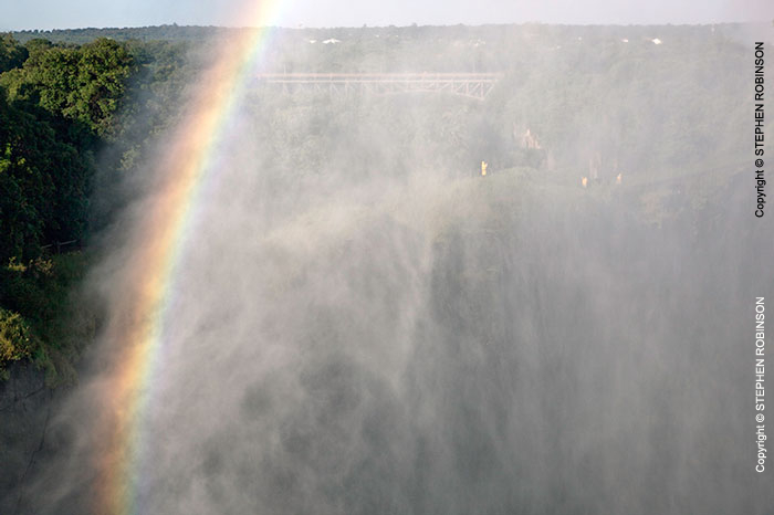 090_TZmS.6463-Rainbow-&-Tourists-Victoria-Falls-Zambezi-R-Zambia
