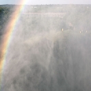 004_TZmS.6463-Rainbow&People-Victoria-Falls-Zambia
