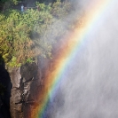 005_TZmS.6661V-Rainbow&People-Victoria-Falls-Zambia