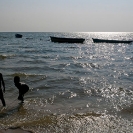 052_TZmN.8152-Lake-Mweru-Boats-&-Children-Bathing-N-Zambia