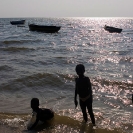 053_TZmN.8153-Lake-Mweru-Boats-&-Children-Bathing-N-Zambia