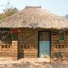 011_CZmA.8651-African-Painted-House-Only-God-Will-Charge