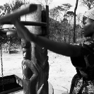 030_CZmA.8800BW-African-Village-Woman-&-Carved-Water-Well-NW-Zambia