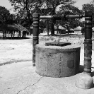 033_CZmA.8759BW-African-Carved-Water-Well-&-Remote-Village